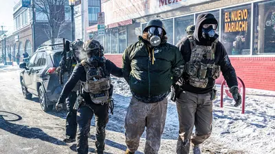 TOPSHOT US IMMIGRATION ICE SHOOTING 6 1769339099694 1769339111812