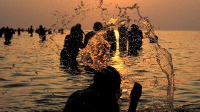 Hindu pilgrims take a holy dip in the Ganga AFP 1770114716575