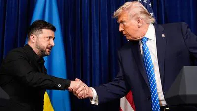 Ukraine President Volodymyr Zelenskyy left shake 1771934436915