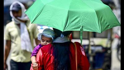A woman protects herself and her child from the sc 1777306916762
