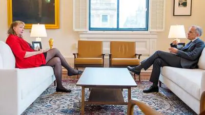 Canadian Prime Minister Mark Carney right with e 1775711314859