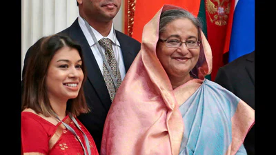 FILE Tulip Siddiq left stands beside Banglades 1776433655676