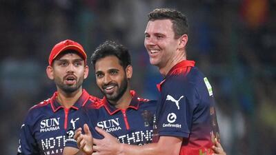 RCB s Bhuvneshwar Kumar C and Josh Hazlewood dur 1777312498467
