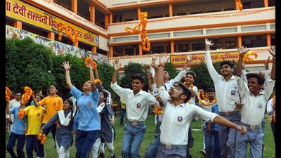 Students in Prayagraj cheer after the declaration 1776961020425