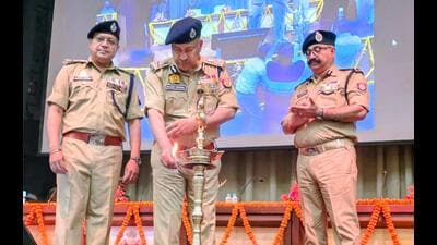 UP DGP Rajeev Krishna lights the lamp while inaugu 1777050390561