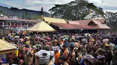 sabarimala devotees celebrate makaravilakku day in sabarimala pti photo