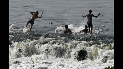 Boys bathe in the Gomti to beat the heat near Kudi 1779301947141
