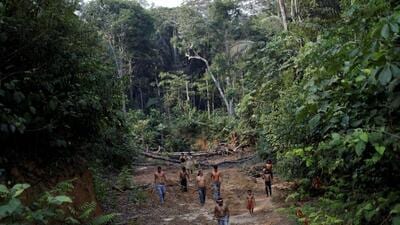 Indigenous people from the Mura tribe show a defor 1778148248593