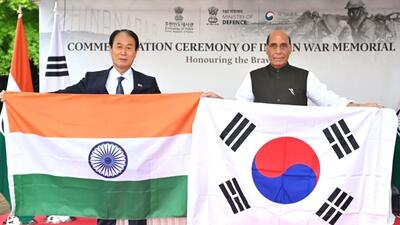 Union defence minister Rajnath Singh right with 1779353024531