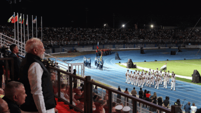 pm modi watches indian contingents march at seychelles 50th independence