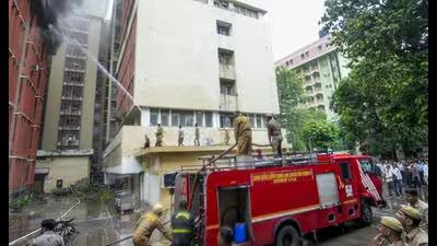 Fire personnel conduct a dousing operation after f 1784559564561