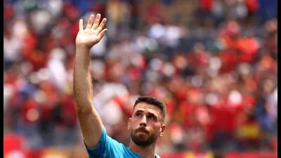 Spain s Unai Simon celebrates after the match agai 1783615796334