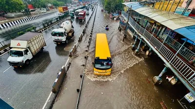 Vehicles wade through a waterlogged stretch amid h 1783502572124 1783502585636 61542773 5b5d 4c36 be